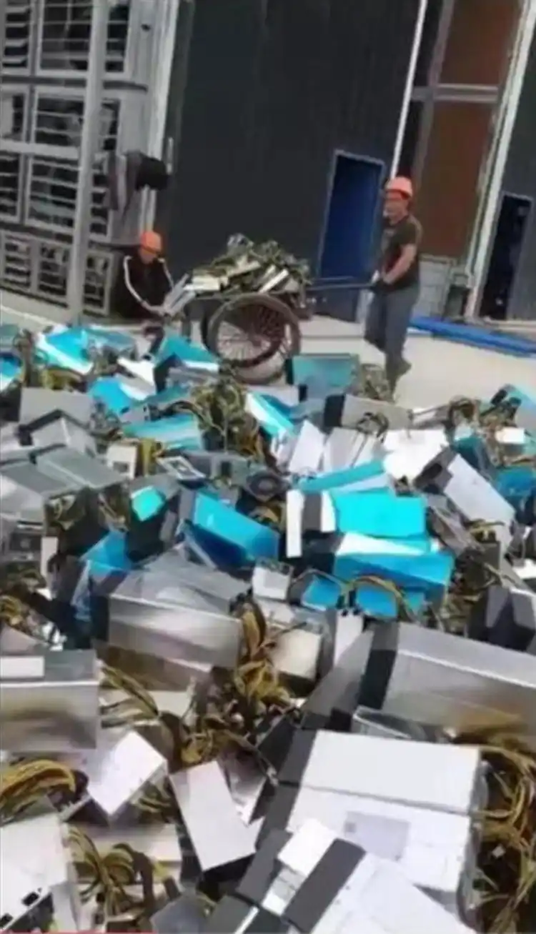 An overview of a bustling mining farm, showcasing the organized chaos of hosted mining machines